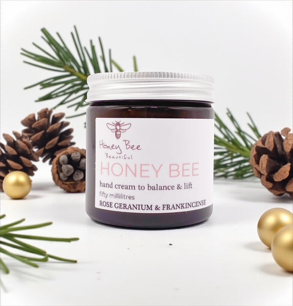 Raw honey hand cream in recyclable tube ultra-nourishing blend for dry, mature or menopausal skin to restore softness and repair rough hands.