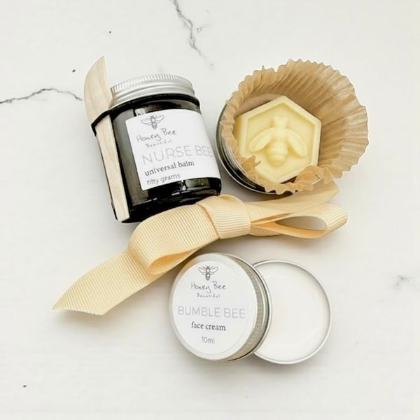 Hydrating raw honey skincare trio including soothing balms and face cream perfect for women over 40 with dry, dry or hormonal skin needing deep moisture and glow.