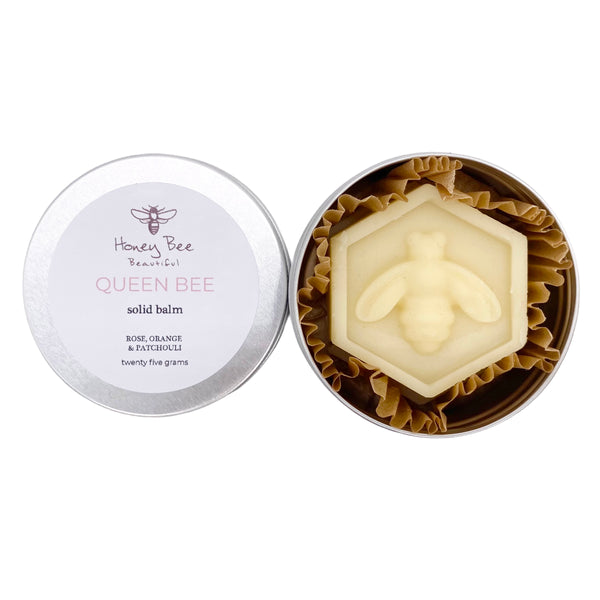 A rich raw honey and beeswax balm in a handy aluminium tin with rose, orange and patchouli as a multipurpose moisturiser for very dry or sensitive menopausal skin, soothing and protective with natural ingredients.