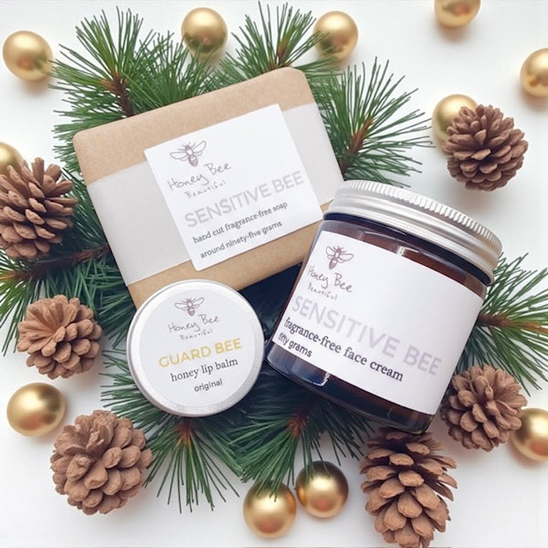 Complete fragrance free skincare set with raw Welsh honey and beeswax, tailored for sensitive and dry skin. Christmas edition packaged in festive gift wrap - perfect for gifting.