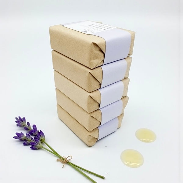 Stack of soothing raw honey soap infused with lavender and lime, beeswax and plant oils, calm, hydrating cleanse for mature or sensitive skin.